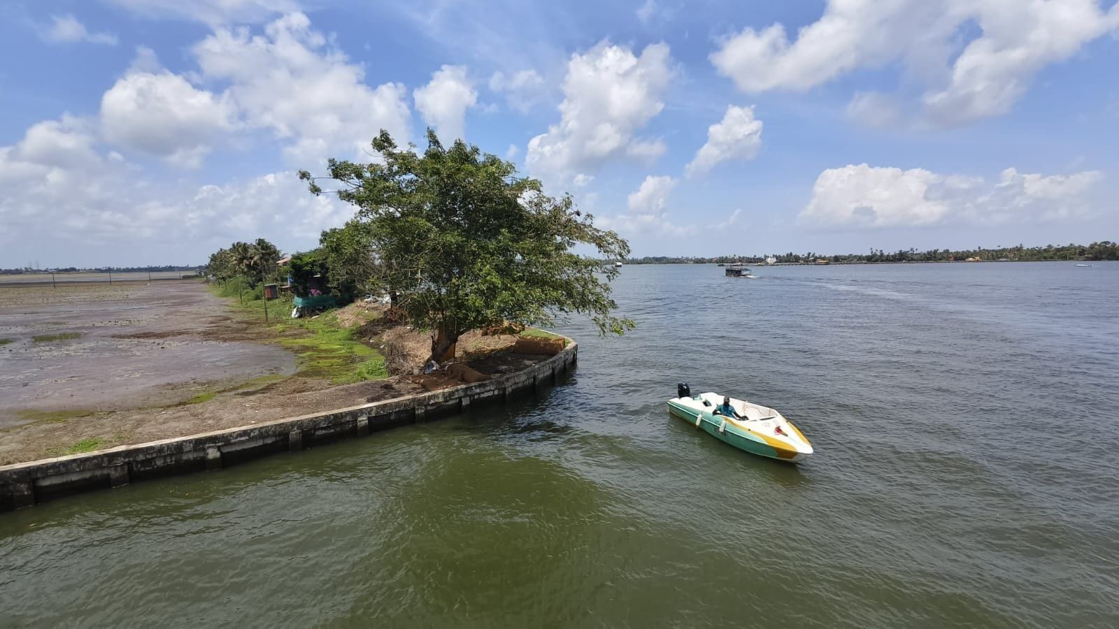 Speedboat on the open waters of Vembanad Lake